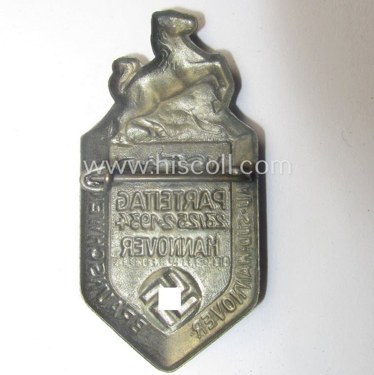 N.S.D.A.P.-related 'tinnie' (ie. 'Tagungs- o. Veranstaltungsabzeichen'-) being a maker- (ie. 'Fr. Linden'-) marked- and bronze-toned example showing the text: 'N.S.D.A.P.-Parteitag - 23/25-2-1934 - Hannover'