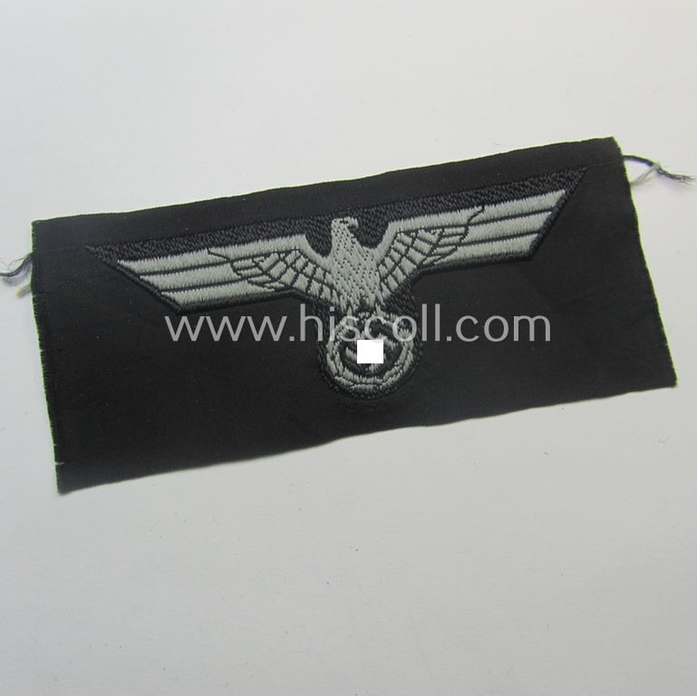 Mid-war-period, WH (Heeres) 'Panzer' cap-eagle & cocarde-set (ie. 'Schiffchenmützen-Adler u. Kokarde-Satz für Mannschaften u. Uffz.') being a 'virtually mint' set as executed in bluish-grey-coloured linnen onto a black-coloured background