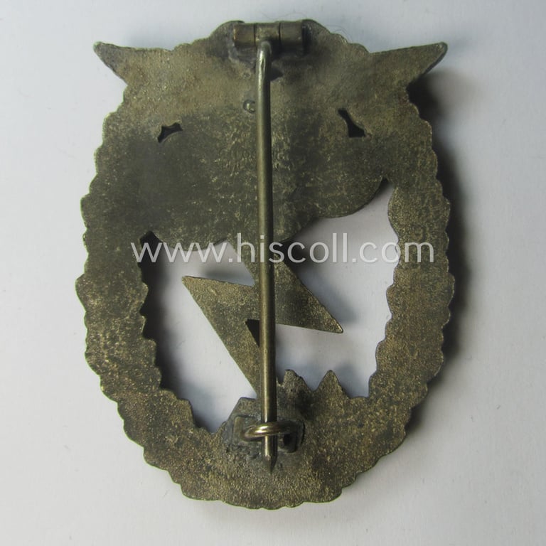 Mid- (ie. later-) war-period, zinc- (ie.'Feinzink'-) based version of a WH (Luftwaffe) 'Erdkampfabzeichen' (being a maker-marked example by the 'G.H. Osang'-company)