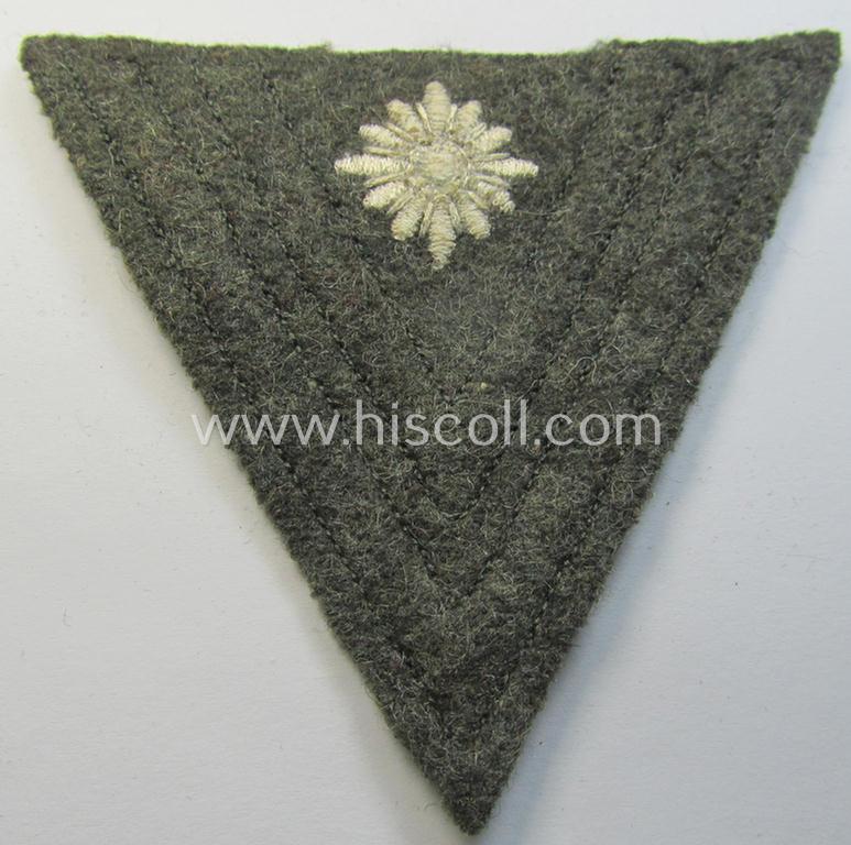 Attractive, WH (Heeres) 'Armwinkel' (or: arm-chevron) as executed on typical field-grey-coloured wool as was specifically intended for usage by a soldier with the (unusually encountered!) rank of: 'Stabsgefreiter'