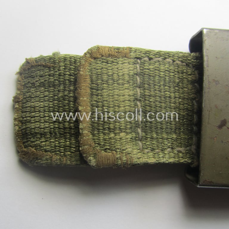 WH (Heeres) 'tropical-issued' belt-buckle being a non-maker-marked, field-grey-coloured example that comes mounted onto its original, greenish-coloured- (and/or: 'webbing'-based-) tab