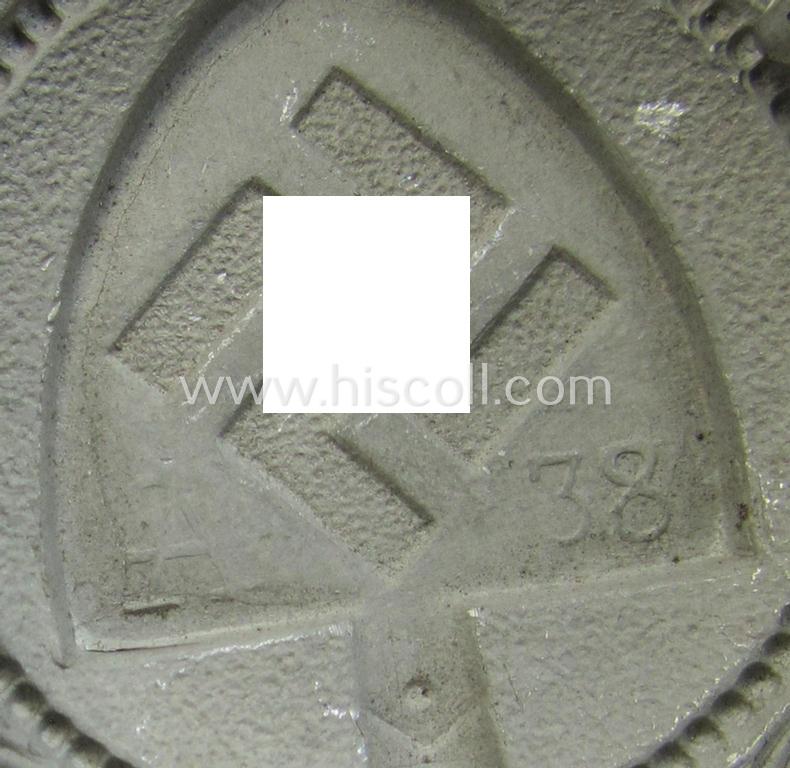 Superb, aluminium-based: 'Reichsarbeitsdienst'- (ie. RAD-) EM- (ie. NCO-) type belt-buckle being a maker- (ie. 'F.W. Assmann u. Söhne'-) marked example which is dated: '1938' and that comes in a simply never used- (ie. 'virtually mint'-) cond...