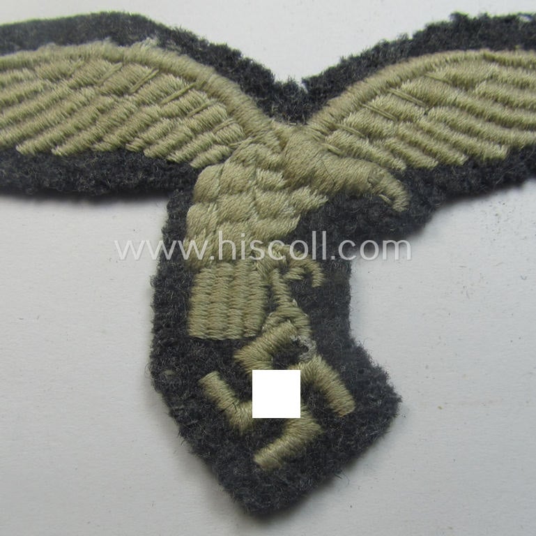 Truly used- ie. worn, WH (Luftwaffe) EM- (ie. NCO-) 'down-tailed'-pattern breast-eagle
