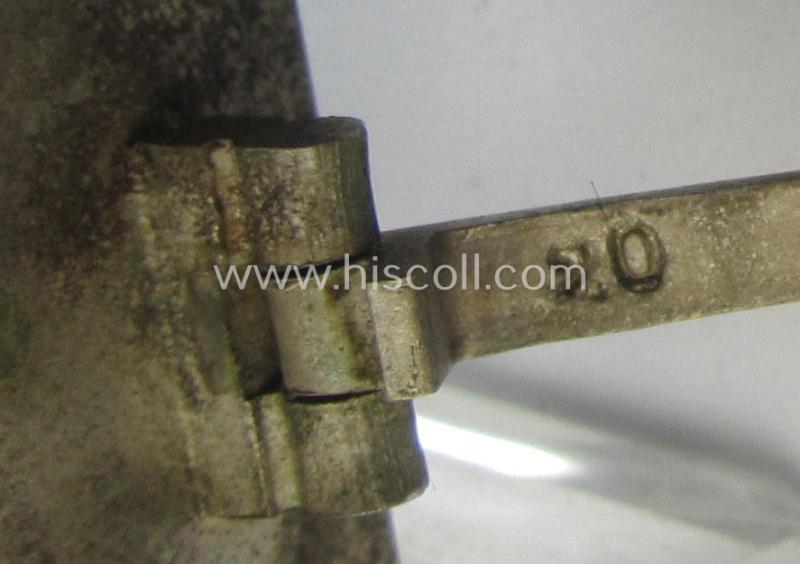 'Eisernes Kreuz 1. Klasse' (ie. Iron Cross 1st class) being an (I deem) mid-war-period produced, neatly maker- (ie. '20'-marked thus by the maker: 'C.F. Zimmermann'-produced) example