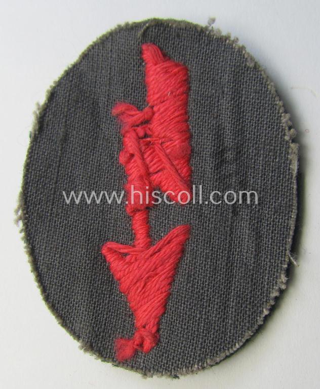 WH (Heeres) trade- and/or special-career-insignia ie. hand-embroidered 'signal-blitz' being a nicely maker-marked example as executed in pink linnen as was specifically intended for a soldier within the: 'Pz- o. Panzerjäger-Truppen'