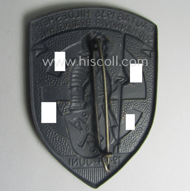 Silverish-coloured- and/or tin-based, N.S.D.A.P.-related day-badge (ie. 'tinnie' or: 'Veranstaltungsabzeichen') being a commemorative example that is entitled: 'Gautag 1936 Hildesheim - Süd Hannover - Braunschweig - 12./14. Juni 1936'