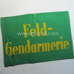 Wehrmacht-related, bright-green-coloured and/or linnen-based armband entitled: 'Feldgendarmerie' (as...