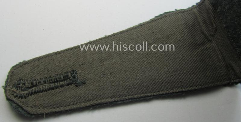 Single, WH (Heeres) EM-type 'cyphered' shoulderstrap: 'Soldat des Infanterie-Regiments 107'