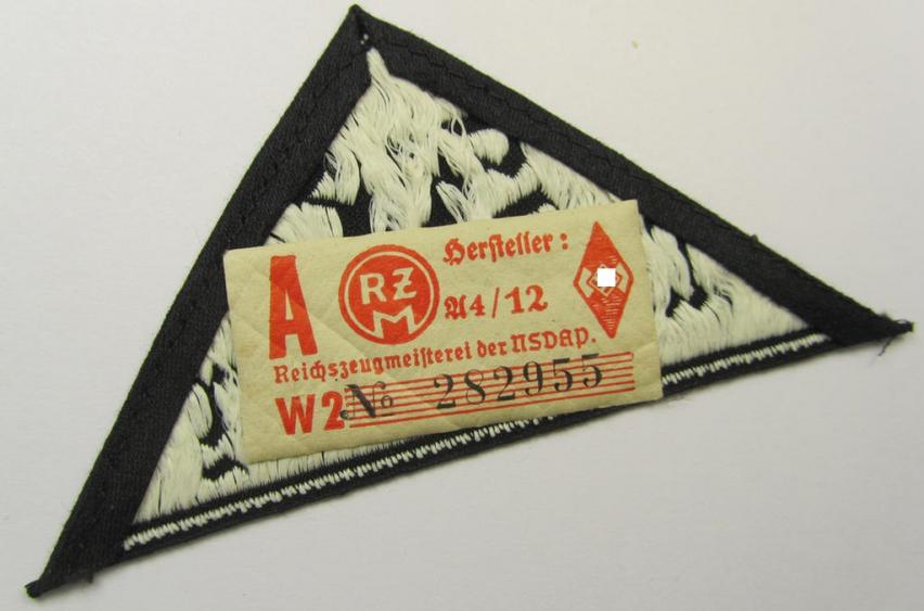 Attractive, 'HJ' ('Hitlerjugend') ie. 'BDM' ('Bund Deutscher Mädel'-) district-triangle (ie. 'Gebietsdreieck') entitled: 'Süd Württemberg' (being a never worn example that still retains its period-attached 'RzM'-etiket)