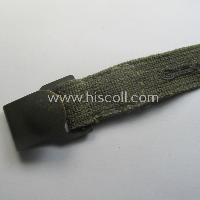 Complete, 2-pieced 'standard-issue'-pattern- (ie. typical WH-issue) carrying-strap (ie. 'Tragelasche') as was intended for the various gasmask-containers (being a maker-marked example that comes in a just minimally used, condition)