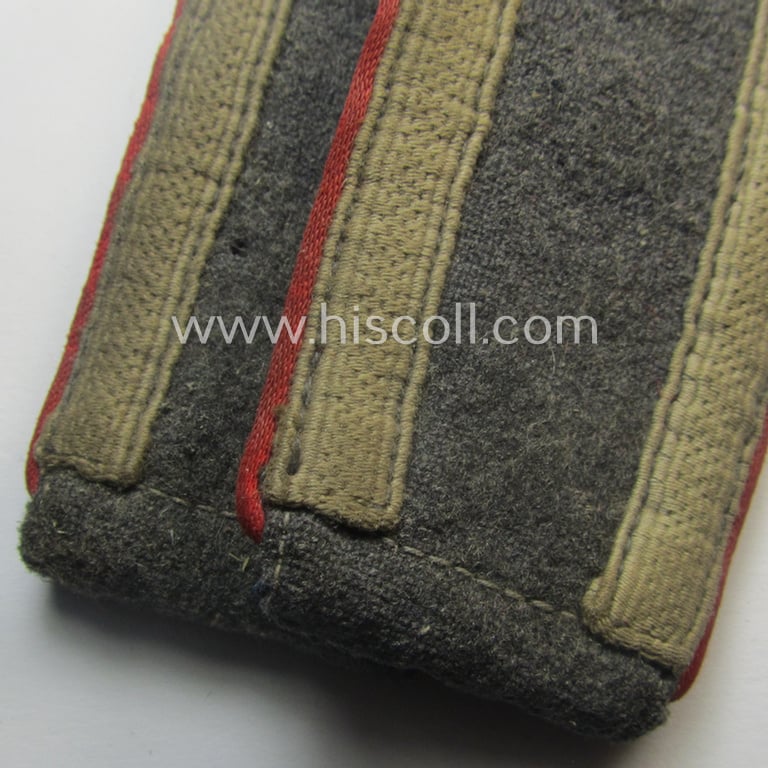 Pair of WH (Luftwaffe) NCO-type shoulderstraps as piped in the bright-red branchcolour as was intended for an: 'Uffz. o. Unterwachtmeister der Flak-Art.-Trpn.'