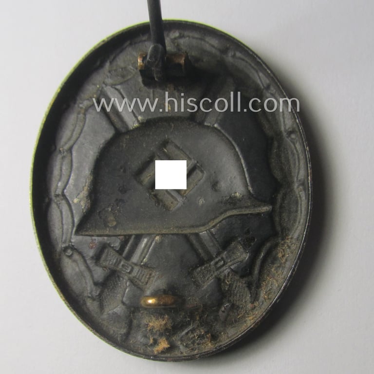 Moderately used- and/or worn, black-class wound-badge (or: 'Verwundeten-Abzeichen in Schwarz') being a typical (early!) non-magnetic and/or non-maker-marked example