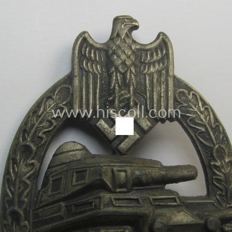 'Panzerkampfabzeichen in Silber' (or: silver-class panzer-assault badge or PAB) being a clearly maker- (ie. 'AS' in a triangle-) marked- and/or typical zinc- (ie. 'Feinzink'-) based specimen as was procuced by a to date unknown maker