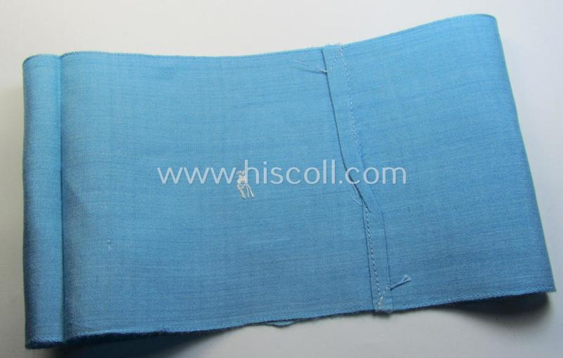 Attractive, linnen-based- and/or light-blue-coloured armband (ie. 'Armbinde') depicting an interwoven capital 'M'-character as was presumably intended for staff-members of the German RLB (ie. 'Reichsluftschutz-Bund')