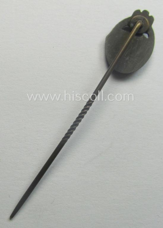 Neat - and 17 mm. sized! - miniature-lapel-pin depicting a: 'Panzerkampfabzeichen in Bronze' (or: bronze-class panzer-assault-badge ie. PAB) being a non-maker-marked example as executed in darkened, bronze-coloured metal