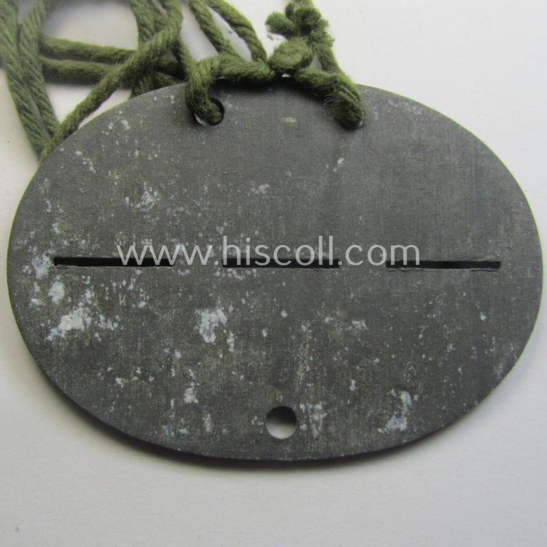 Interesting, zinc- (ie. 'Feinzink'-) based, female-staff-related ID-disc (ie. 'Erkennungsmarke') bearing the stamped unit-designation: 'Gen. z.b.V. IV Ers.D. - Betr.Helferinnenschaft'