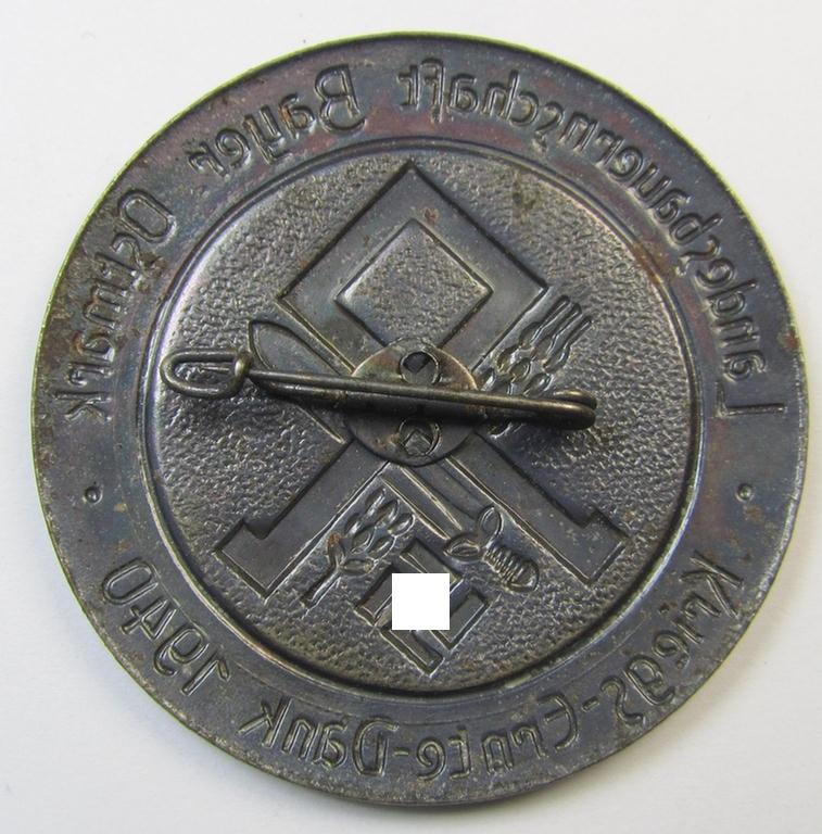 Superb, commemorative 'Reichsnährstand'- (ie. 'RNSt.'-) related 'tinnie' being a non-maker marked example depicting an Odal-rune- and swastika-device and text: 'Landesbauernschaft Bayer. Ostmark - Kriegs-Ernte-Dank 1940'