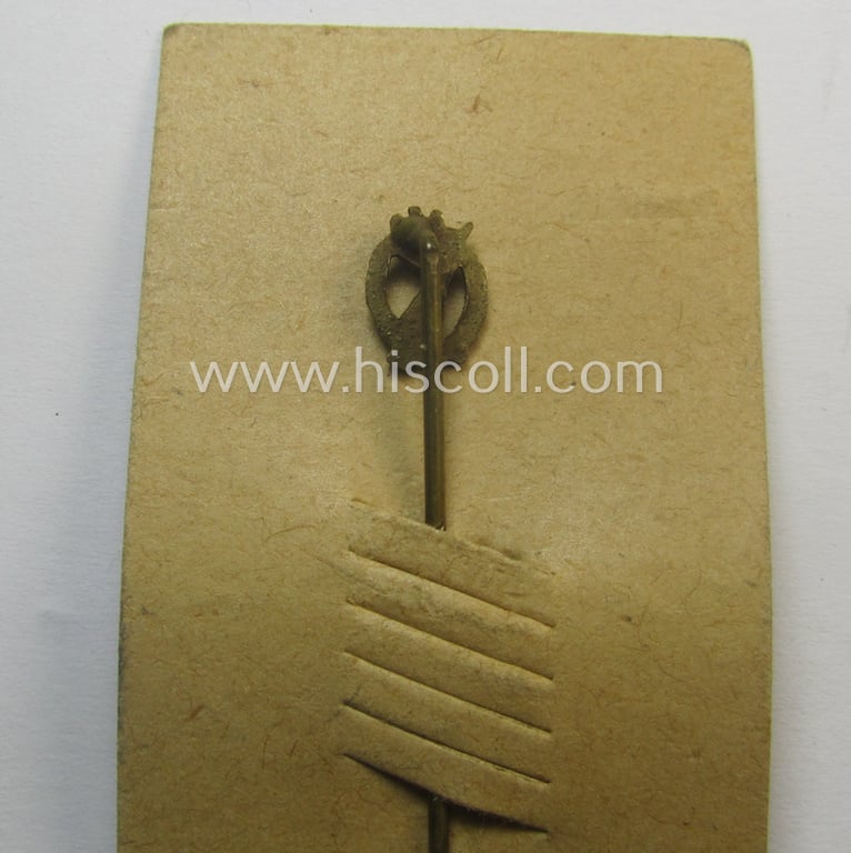 Neat - and only 9 mm. sized! - miniature-lapel-pin depicting an: 'Infanterie Sturmabzeichen in Bronze' (or: bronze-class assault-badge ie. IAB) being a non-maker-marked example that comes mounted onto its period 'LDO'-card