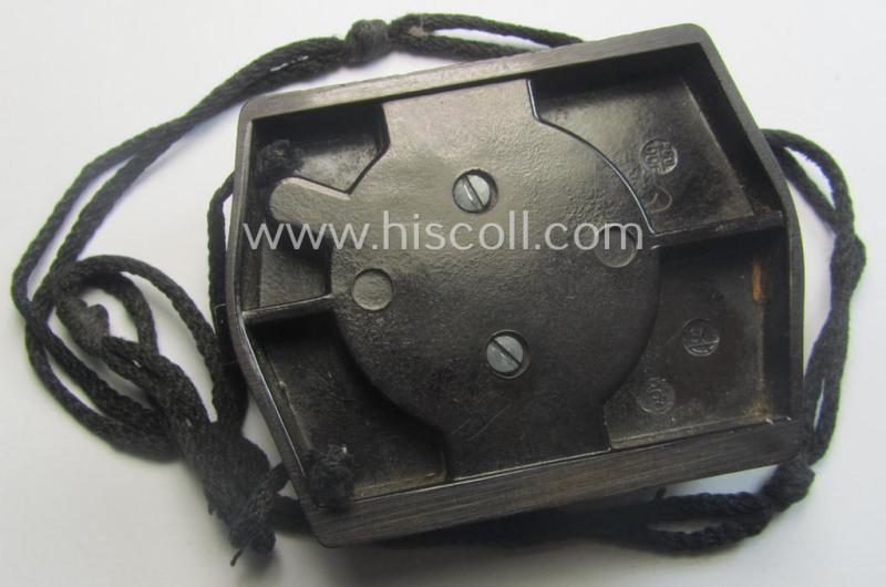 'Standard-issue'-pattern WH compass (or: 'Marschkompass') as executed in black-coloured 'Bakelite' being - I deem - a later-war-period- and/or maker- (ie. 'CXN'-) marked example that comes mounted on its period cord