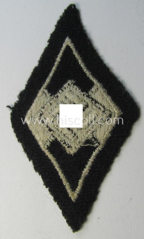 Attractive, Waffen-SS-pattern and machine-embroidered and/or black- and white-coloured sleeve-insignia (ie. 'Ärmelraute') depicting a so-called: 'HJ-Raute' as was used and intended to signify former membership within the 'Hitlerjugend'