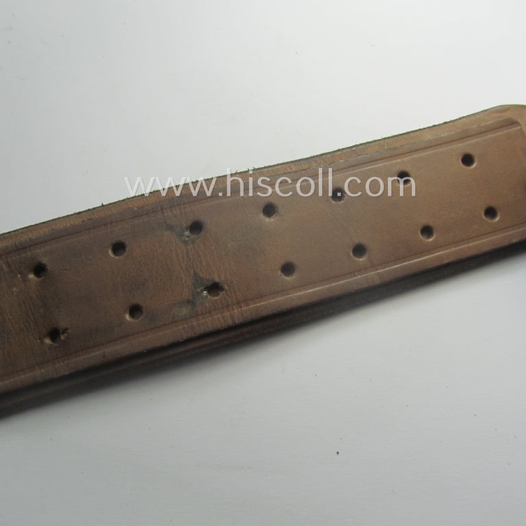 Hardly used, early- (ie. mid-) war-period, black-coloured WH (Heeres, Luftwaffe, Waffen-SS etc.) 'standard-issue'-pattern belt (ie. 'Koppelriemen') being a 115 cms. sized example that shows a (clear) makers'-designation and/or date: '1942'