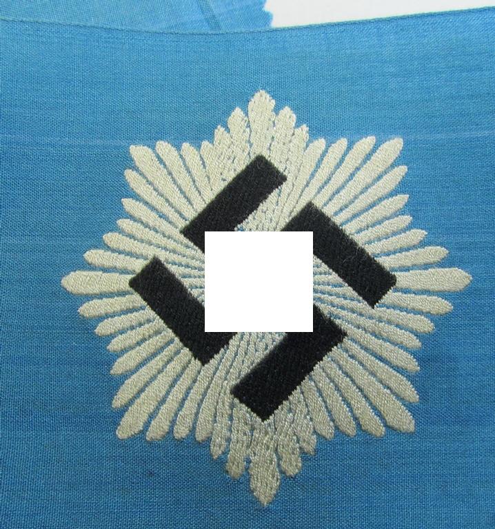 Superb, light-blue-coloured, so-called: RLB (or: 'Reichsluftschutzbund') 'Amtsträger'-armband depicting the typical 'RLB'-logo (without lettering) and that is void of an interwoven makers'-designation