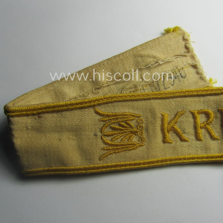Truly worn WH cuff-title (ie. 'Ärmelstreifen') entitled: 'Kreta' (being an example that bears a printed 'RbN.'-numeral!) and that comes in a surely issued and/or carefully tunic-removed, condition