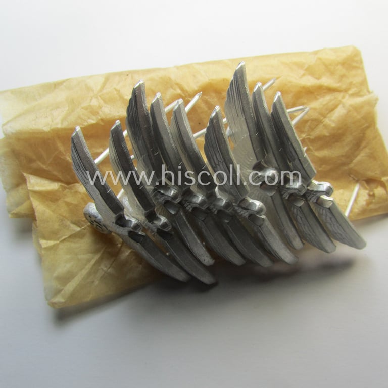 Superb, WH (Heeres) bright-silver-toned (ie. aluminium-based), EM- (ie. NCO- or officers') type visor-cap-eagle being a clearly maker- (ie. 'F.L.L.'-) marked and/or '38'-dated example that comes in a 'virtually mint- ie. unissued'-, condition