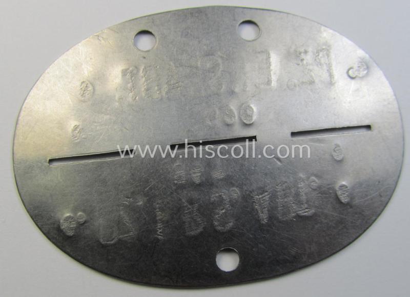 Superb - and scarcely found! - typical stainless-steel-based, WH (Heeres-) ie. 'Panzer'-related ID-disc (ie. 'Erkennungsmarke') bearing the clearly stamped unit-designation that reads: '4./Pz.Ers.Abt.4' and that comes as issued