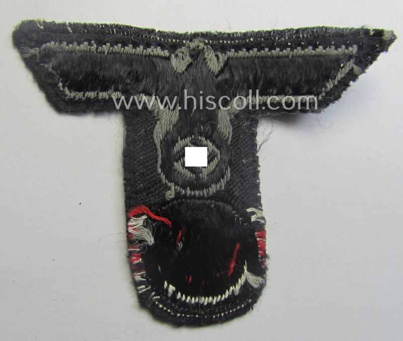 WH (Heeres) 'Panzer'-related, 'T-shaped' ie. 'M42'-pattern cap-eagle/cocarde as executed in 'BeVo'-weave pattern (being a minimally stained example that comes in a clearly used- ie. once cap-attached, condition)