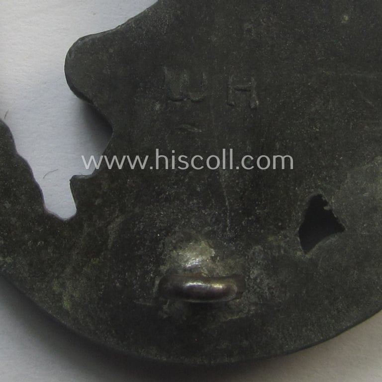 Later-war period- and/or: zinc- (ie. 'Feinzink'-) based- example of a maker- (ie. 'WH'-) marked, WH (Luftwaffe) 'Flakkampfabzeichen' (or: airforce anti-aircraft badge), as was produced by the desirable: 'Wilhelm Hobacher'-company