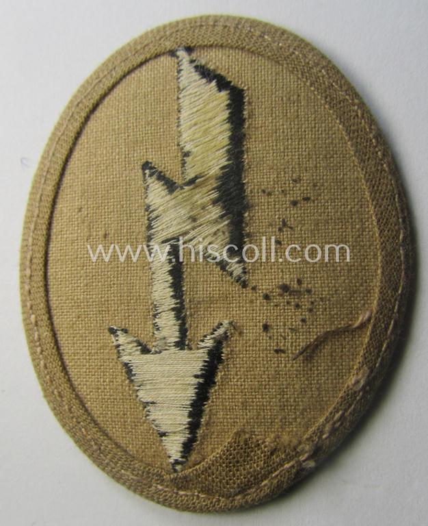 WH (Heeres) 'tropical-styled', trade- and/or special-career insignia (or: 'Signal Blitz') as was intended for a soldier who served within the: 'Pionier-Trpn.'