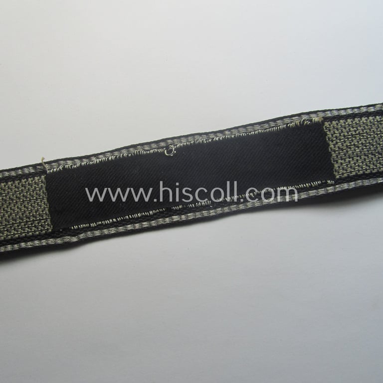 Stunning, Waffen-SS officers'-type, 1939/40-pattern cuff-title (ie. 'Ärmelstreifen') as executed in flat-wire 'BeVo'-weave-pattern (in Gothic-styled script!) for an officer within the: SS-Rgt. 'Deutschland' (2. SS-Pz-Div. "Das Reich")