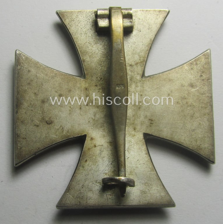 'Eisernes Kreuz 1. Kl.' (or: Iron Cross 1st class) being a typical maker- (ie. '15'-) marked (and non-magnetic!) example that as was produced by the Austrian maker (ie. 'Hersteller'): 'Friedrich Orth'