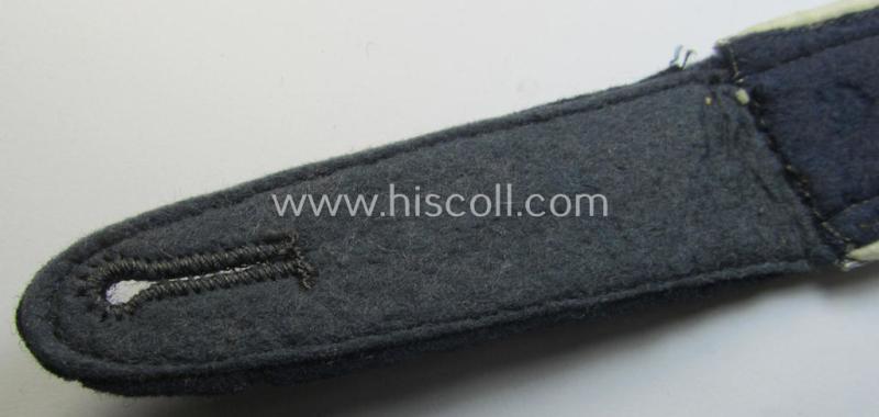 Neat - albeit regrettably single! - WH (Luftwaffe) NCO-type shoulderstrap as piped in the desirable white-coloured branchcolour as was intended for - and with certainty used by! - an: 'Unteroffizier der Hermann Göring-Division'