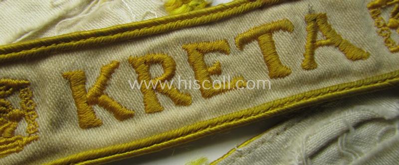 Superb, WH cuff-title (ie. 'Ärmelstreifen') entitled: 'Kreta' (being an example that bears a printed 'RbN.'-numeral and that comes in an issued-, clearly worn- and/or most certainly once tunic-attached, condition)