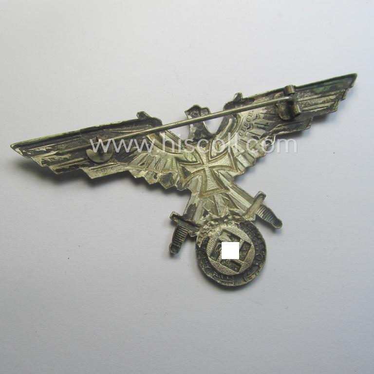 Bright-silver-toned - and I deem 'Buntmetall'-based! - so-called: D.R.K.B. (or: 'Deutscher Reichskriegerbund' aka 'Kyffhäuserbund') enlisted-mens'- (ie. NCO-) type breast-eagle (showing a black-coloured- and neatly painted iron cross-symbol)