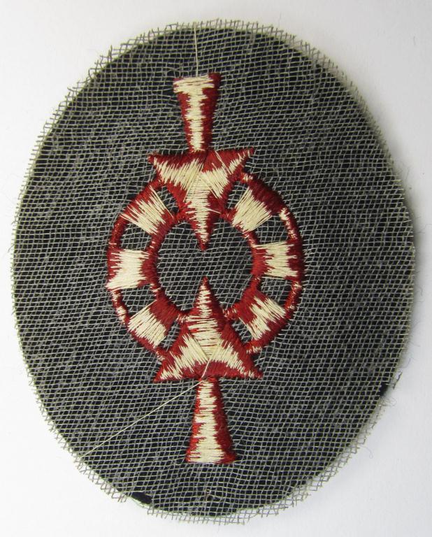 Attractive, WH (Kriegsmarine) neatly machine-embroidered, bright-coloured so-called: naval career- ie. specialist-armbadge (ie. 'Tätigkeits-Abzeichen') as was intended for usage by a: 'Waffenleitvormann'
