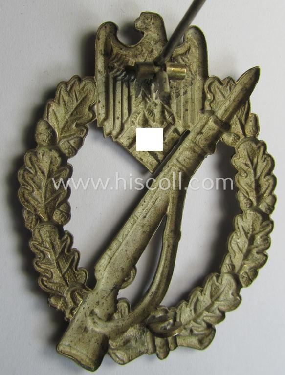 'Infanterie Sturmabzeichen in Silber' (or: silver-class infantry-assault-badge ie. IAB) being a 'Buntmetall'-based example by the: 'Otto Schickle'-company