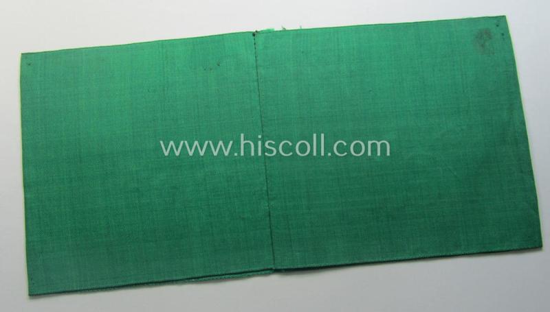 DRB- (ie. 'Deutsche Reichsbahn'-) related armband entitled: 'Reichsbahn' being of the 'entirely-woven'-type onto (typical) silk-like cloth in a technique similar to the 'BeVo'-weave pattern