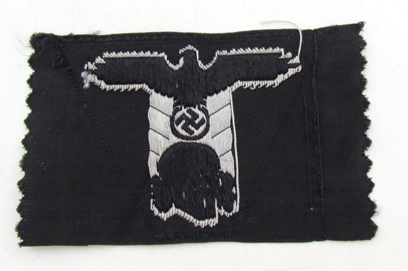 Waffen-SS Panzer ‘BeVo’ trapezoid M43 cap insignia