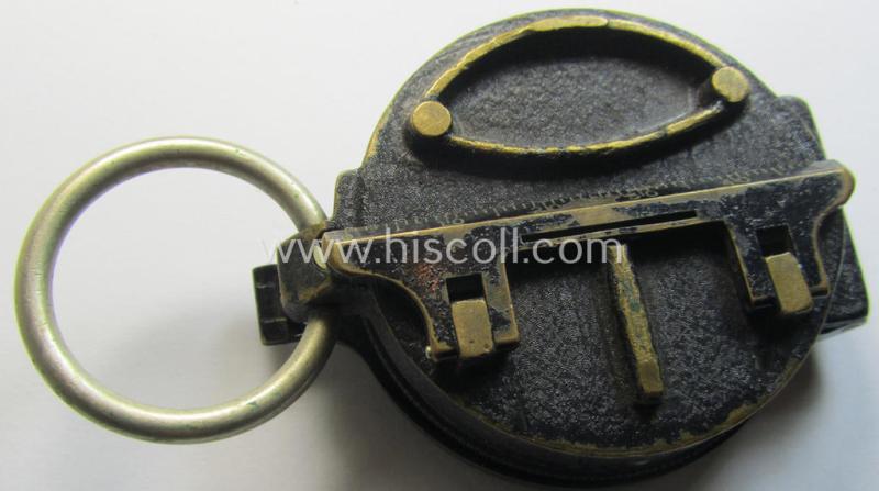 Superb, 'standard-issue'-pattern, black-coloured and/or copper-based WH-compass (ie. 'Marschkompass') which is nicely 'MK'-marked and/or individually numbered: '27854' and that comes mounted onto its period 'Fangschnur'