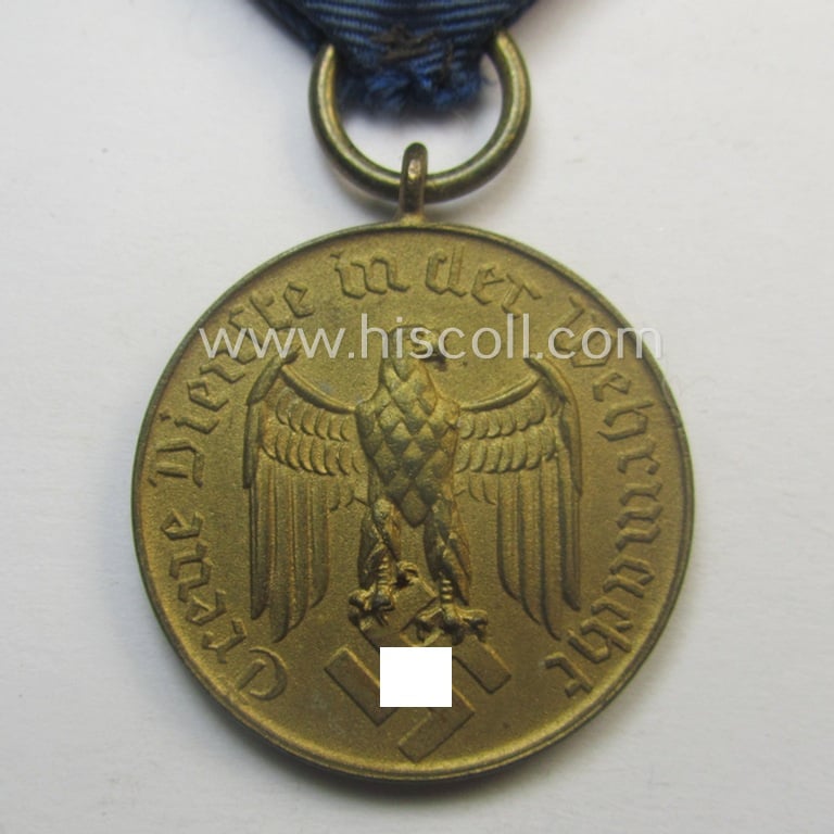 WH (Heeres o. KM) bright golden-toned 'WH-DA der 3. Klasse für 12 Jahre Dienstzeit' that comes mounted onto its accompanying ribbon (ie. 'Bandabschnitt') having a golden-toned eagle-device attached