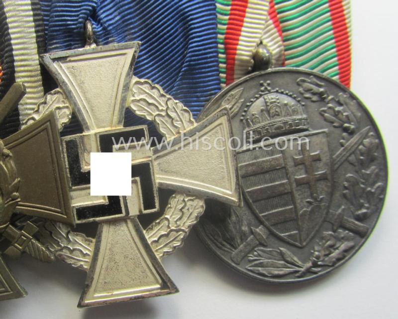 4-pieced, 'WWI'- (ie. TR-) related medal-bar (ie. 'Ordenspange') resp. depicting a WWI-period: 'EK II.Kl.', a: 'FKK 1914-18', a: 'TD-Ez. der 2. Kl.' and an Austrian WWI-commemorative medal