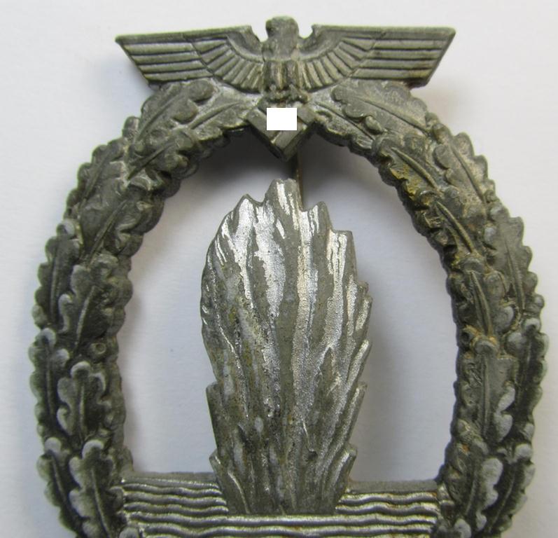 WH (KM) 'Kriegsabzeichen für Minensuch-, U-Boot-Jagd und Sicherungs-Verbände', being a detailed (albeit non-maker-marked) example as executed in multi-coloured 'Feinzink' and that was produced by the: 'Adolf Scholze'-company