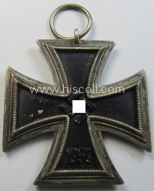 Neat, Iron Cross 2nd class (or: 'EK II. Klasse') being a non-maker-marked example that comes mounted onto its original (Austrian-styled!) ribbon (ie. 'Bandabschnitt') as was (I deem) produced by the (Austrian-based) company named: 'Rudolf Souval...