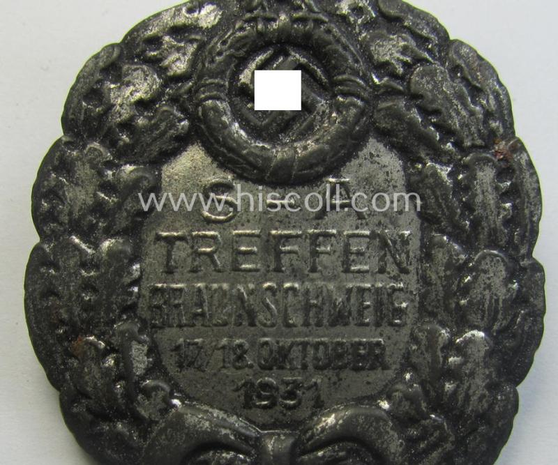 Commemorative, hollow-back- and/or silverish-grey-toned, so-called: SA- (ie. 'Sturmabteilungen'-) related day-badge (ie. 'tinnie') as executed in zinc-based- metal that is showing the text: 'SA-Treffen Braunschweig - 17./18. Oktober 1931'