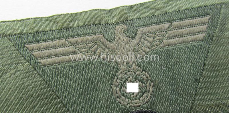 WH (Heeres) so-called: 'M43-pattern') cap-eagle/cocarde (ie. cap-trapezoid) as was specifically produced for usage on the so-called: 'M-43'-model field-caps (ie. 'Einheitsfeldmützen')