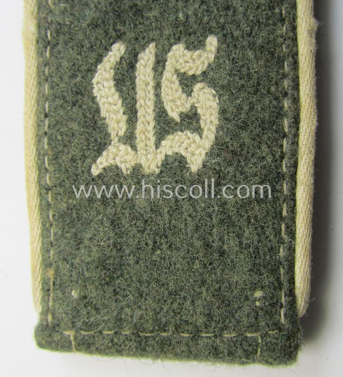 Single - albeit nevertheless rarely seen! - WH (Heeres) NCO-type, 'M40- (ie. 43'-) pattern- and neaty 'cyphered' shoulderstrap as was intended for usage by a: 'Soldat der Inf.-Truppen u. Mitglied einer Unteroffiziersschule'