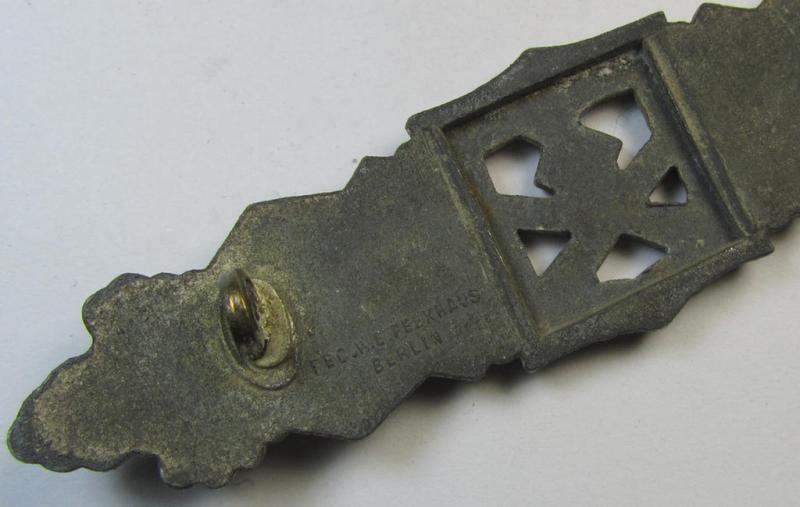 'Nahkampfspange in Silber' (or: silver-class close-combat clasp ie. CCC) being a maker- (ie. 'FLL'-) marked- and/or minimally converse-shaped so-called: '2nd pattern'-specimen as was produced by the maker- (ie. 'Hersteller') 'Friedrich Linde...